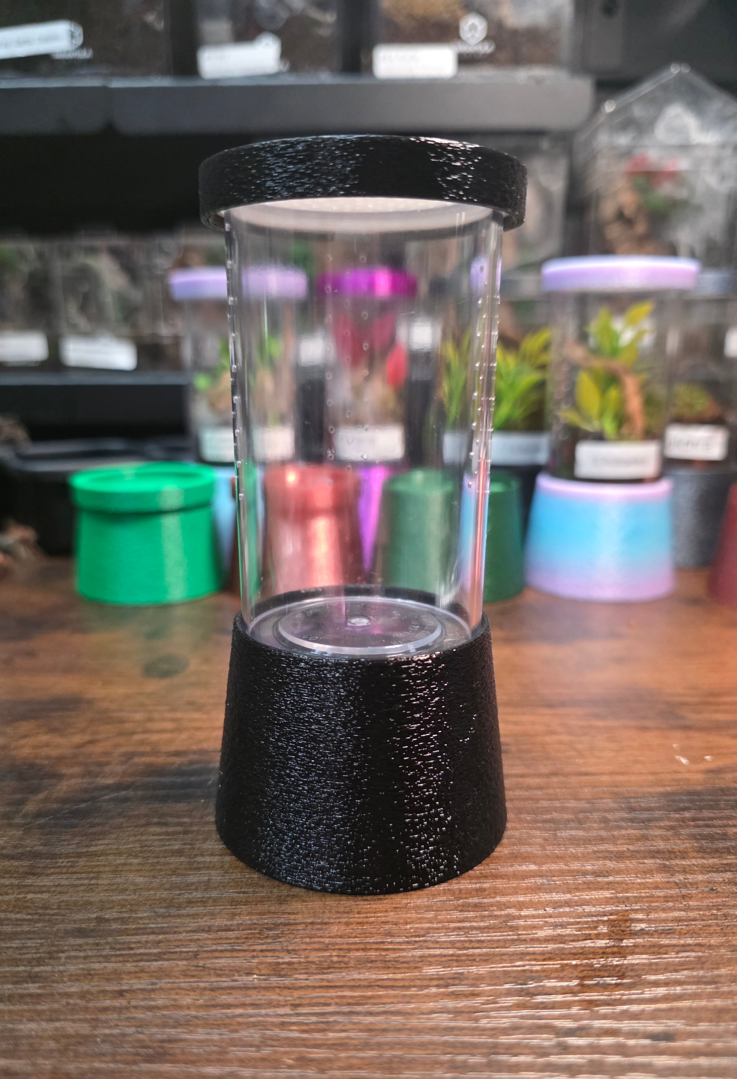Vial enclosure with stand